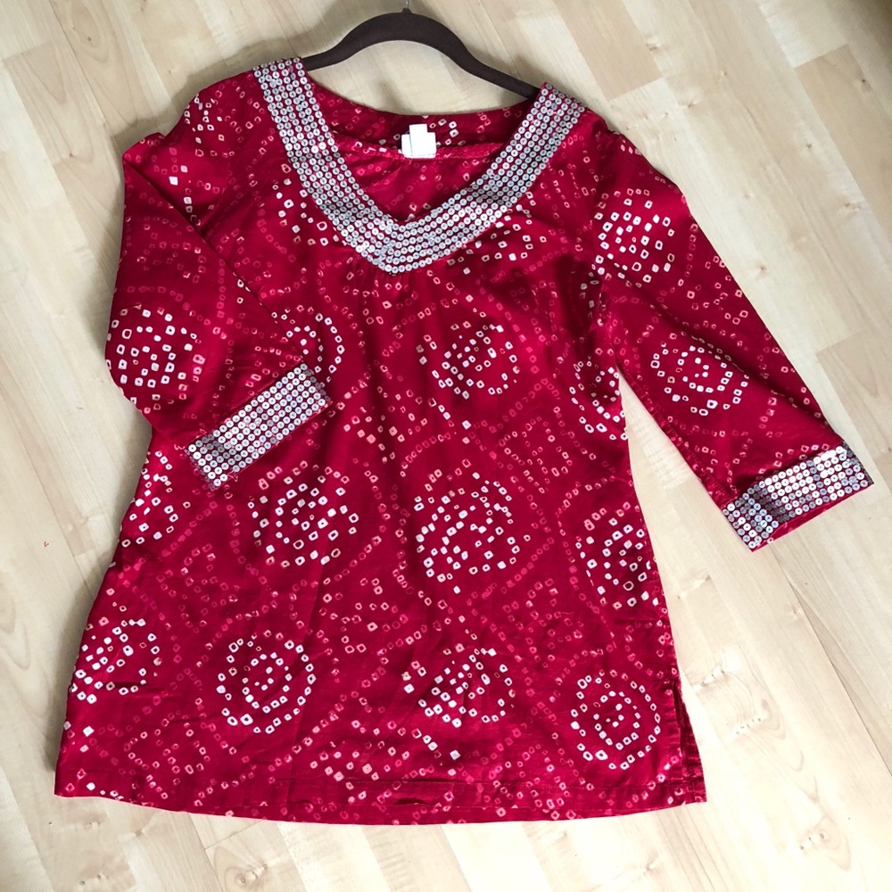 Red and silver blouse